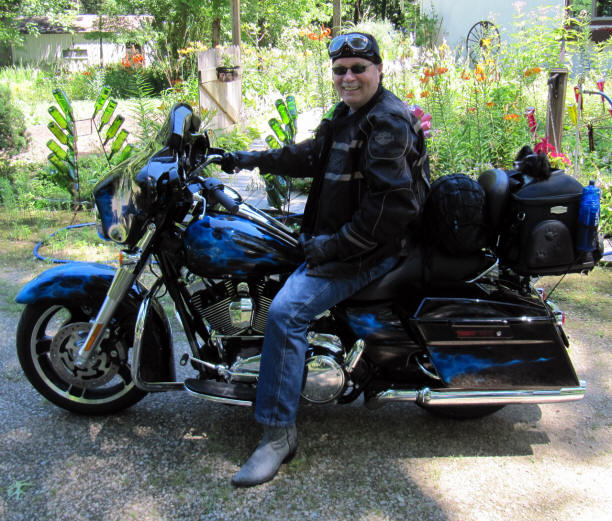 Larry Swanson with Mia on his Harley.